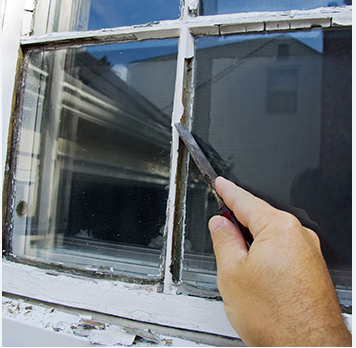Removing broken windows, new glazing